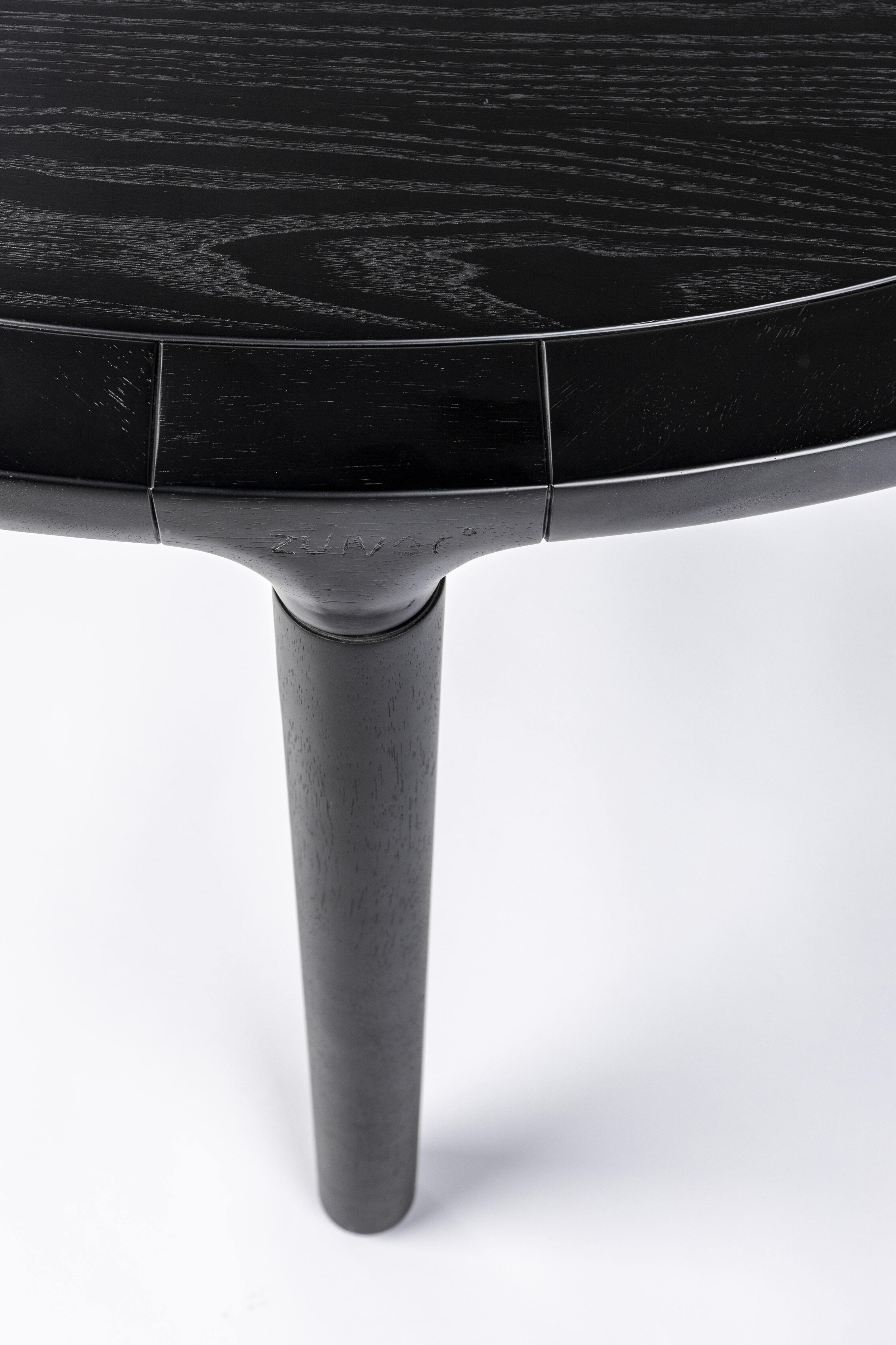 Zuiver Ronde Eettafel 'Storm' Essenhout, 128cm, kleur Zwart